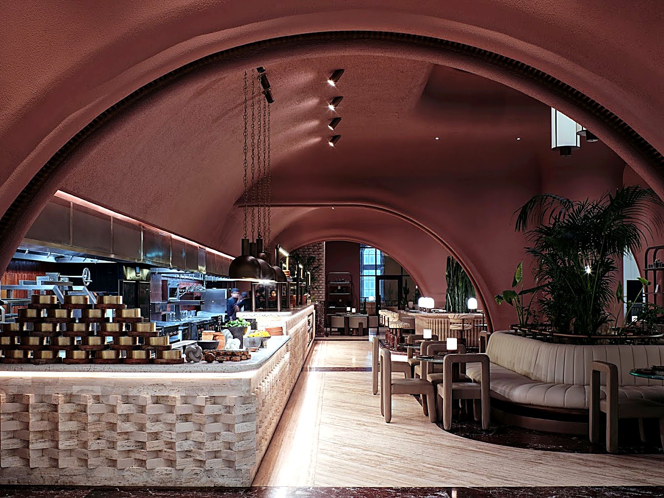 Buffet counter with a fluted stone front beneath an arched ceiling