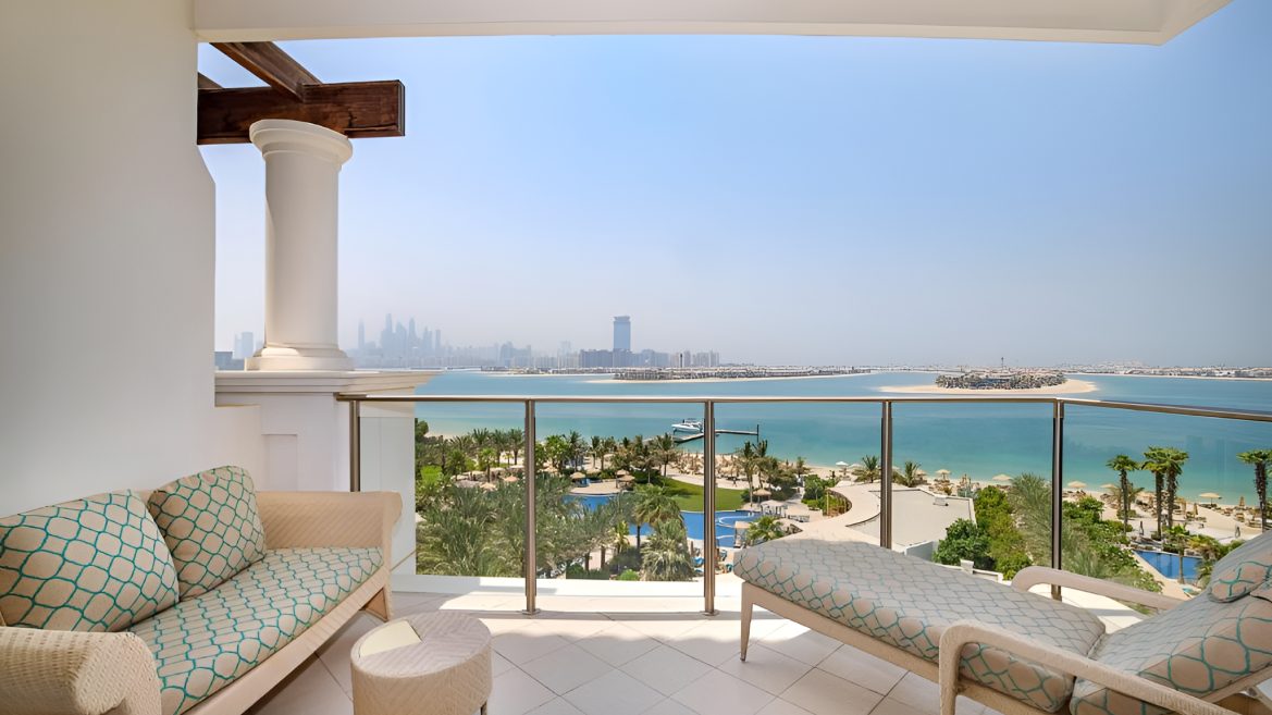 Balcony seating overlooking the beach and Dubai skyline