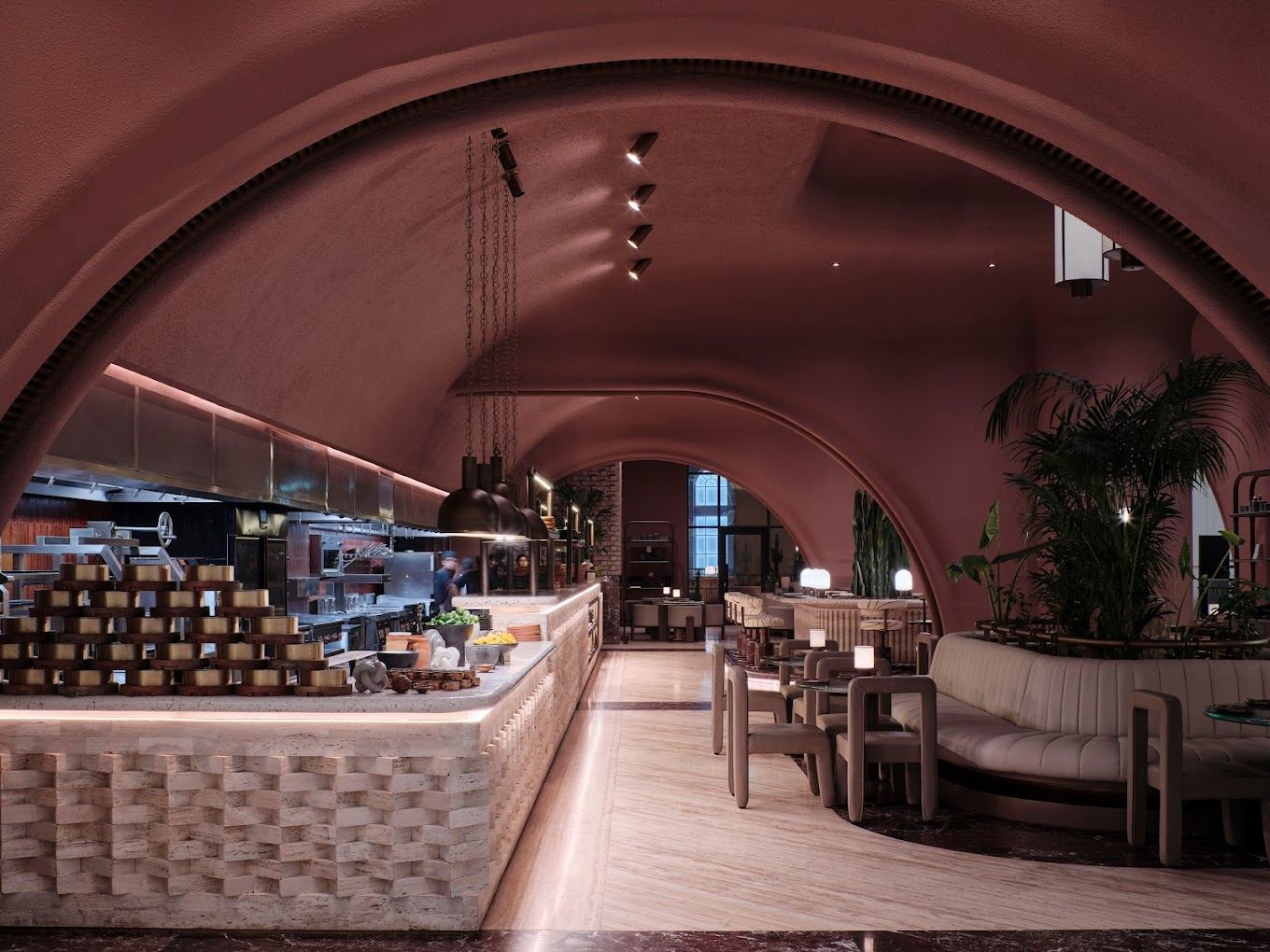 Restaurant under a terracotta barrel vault with a textured stone counter